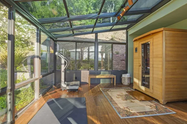 a view of a yard with a tree