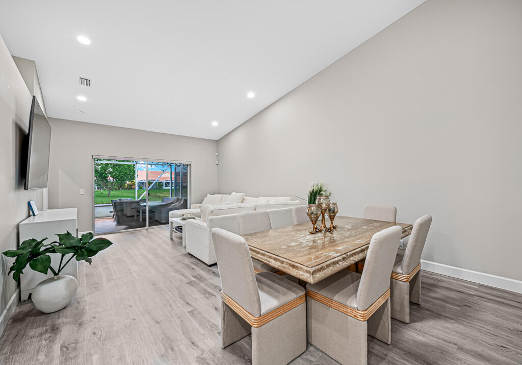 8425 Logia Circle Boynton Beach, FL 33472 - Photo 15 of 52 dining room is open to home!