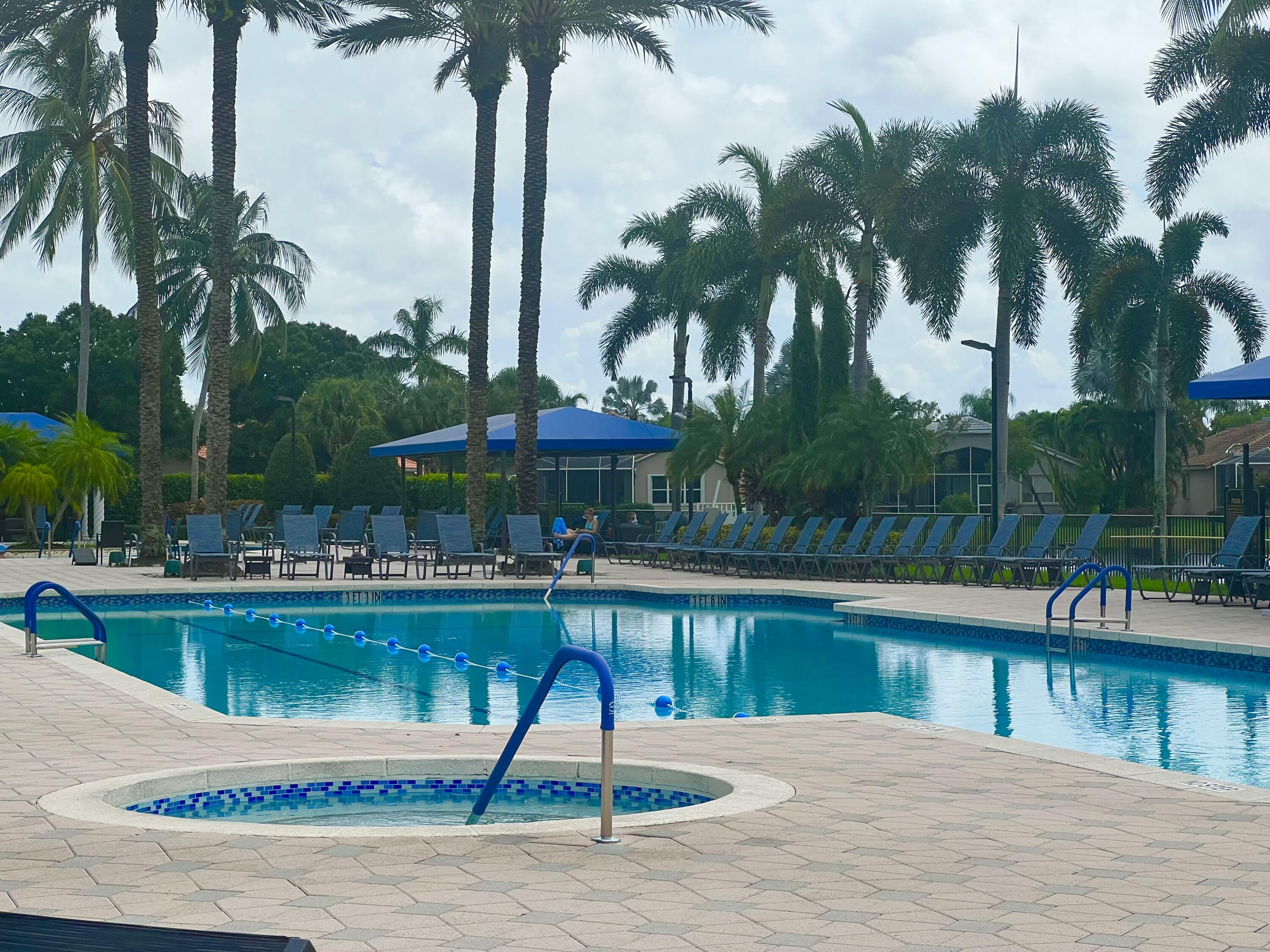 8425 Logia Circle Boynton Beach, FL 33472 - Photo 32 of 52 Fabulous Main Social pool!