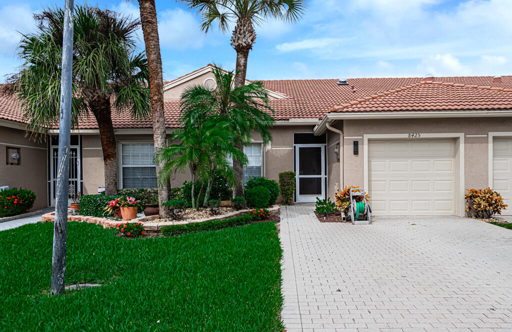 8425 Logia Circle Boynton Beach, FL 33472 - Photo 5 of 52 beautiful curb appeal!