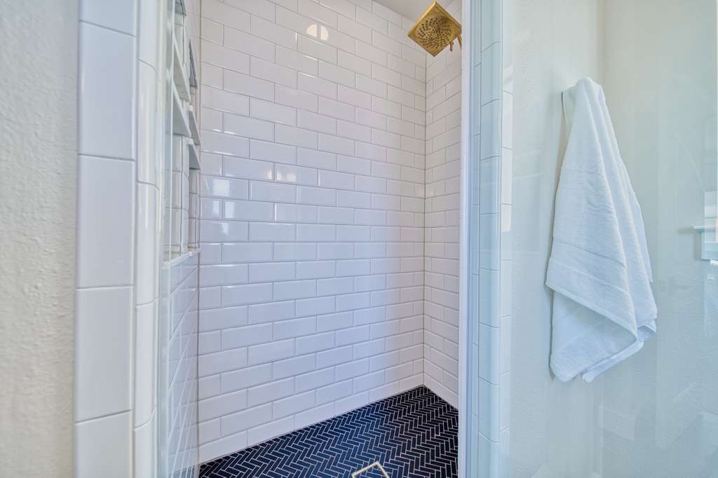 4113 Camacho Street Austin, TX 78723 - Photo 28 of 36 a bathroom with a shower