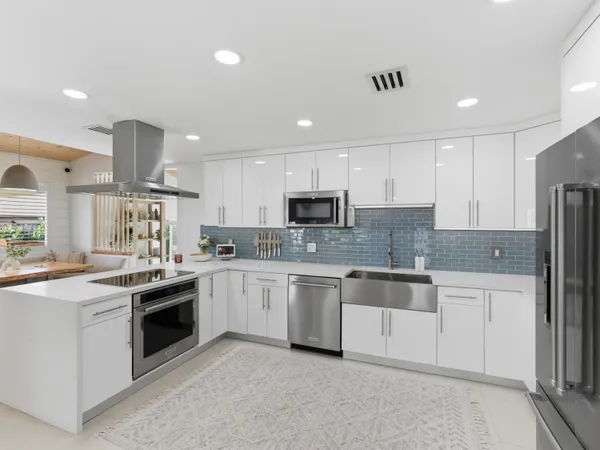 a bathroom with a toilet and shower