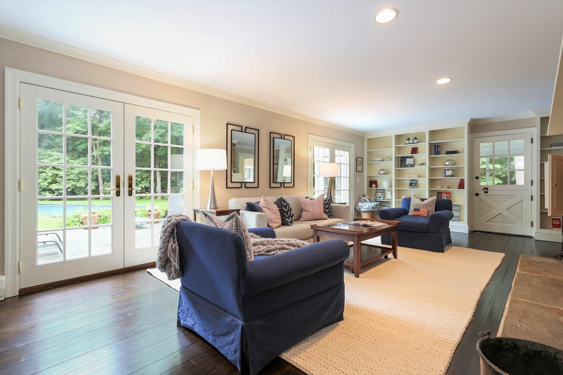 107 Inwood Road Darien, CT 06820 - Photo 14 of 40 a living room with furniture and a large window