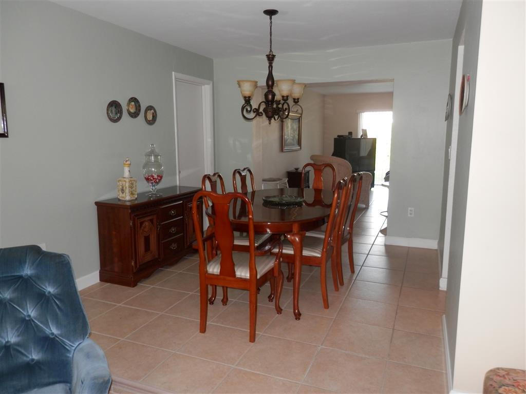 6311 Southwest 93rd Court Miami, FL 33173 - Photo 5 of 9 a view of a dining room with furniture
