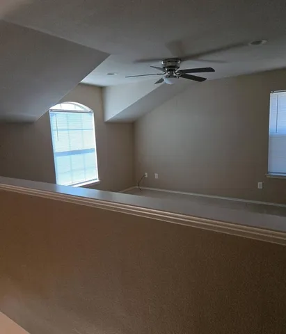 en empty room with windows