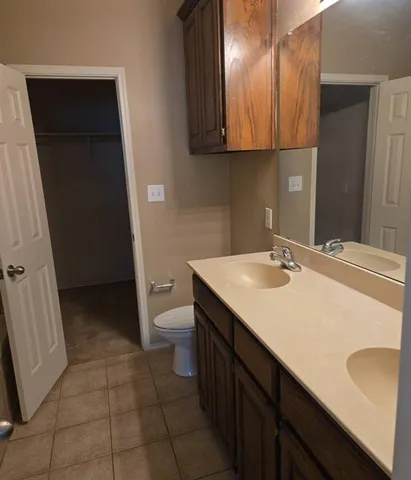 a bathroom with a sink and a toilet