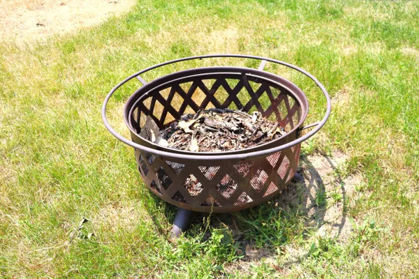 a view of a fireplace in a garden