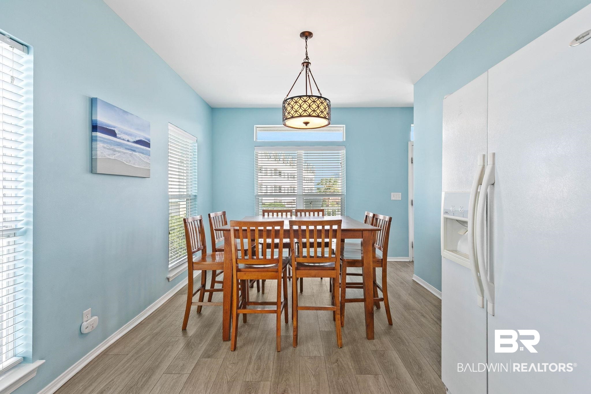 545 Plantation Road, Unit 3 Gulf Shores, AL 36542 - Photo 17 of 54 Dining space featuring light wood-style flooring and baseboards