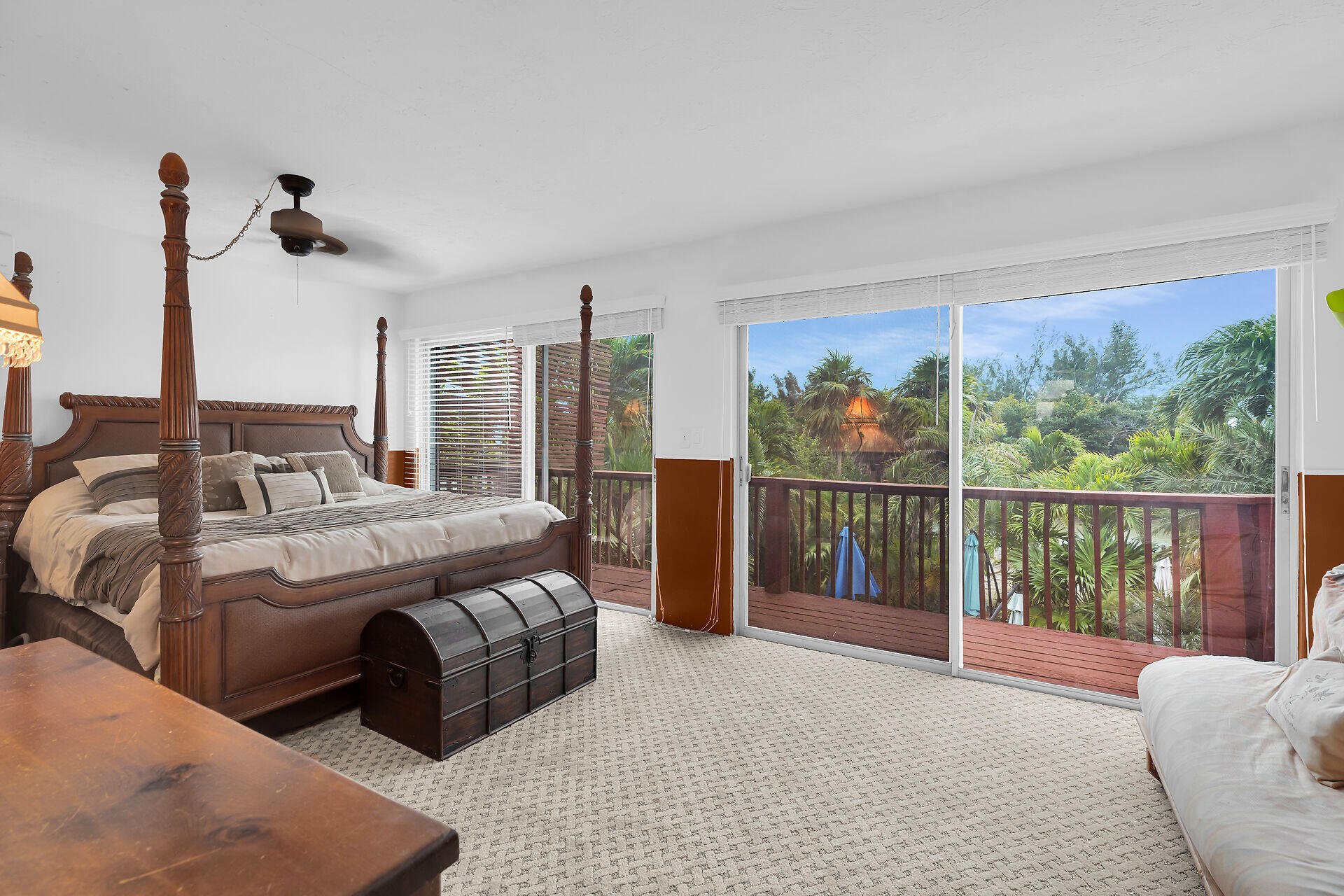 42 Treasure Road Marathon, FL 33050 - Photo 20 of 70 a bedroom with a large bed and a balcony view