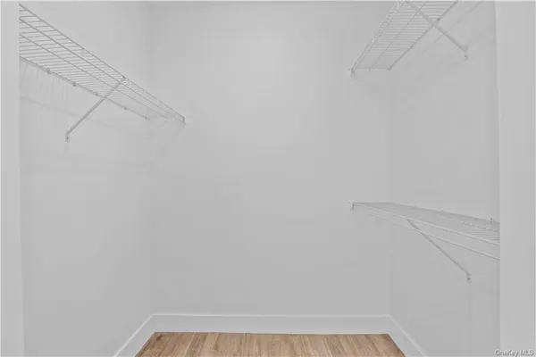 a view of small space with racks on the wall