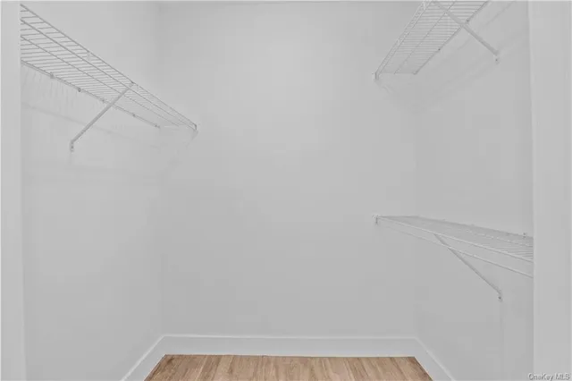 a view of small space with racks on the wall