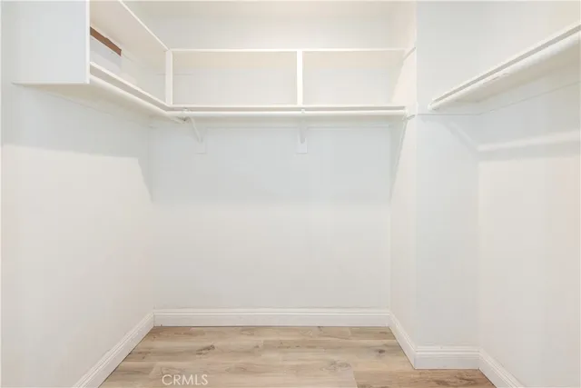 a view of an empty walk in closet