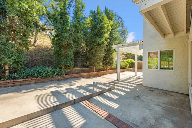a view of a house with a patio