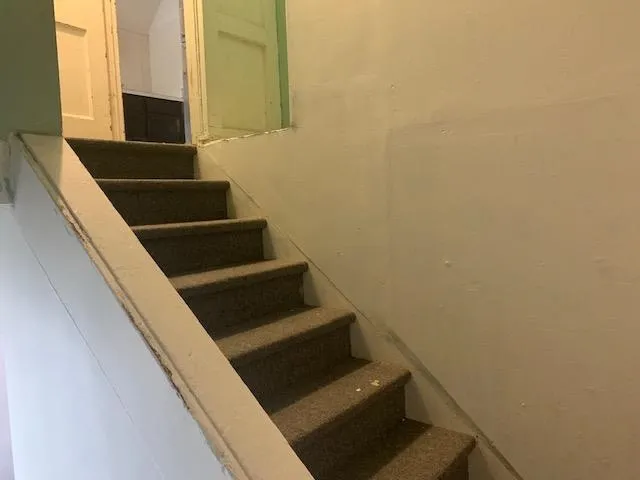 a view of a room with shelves