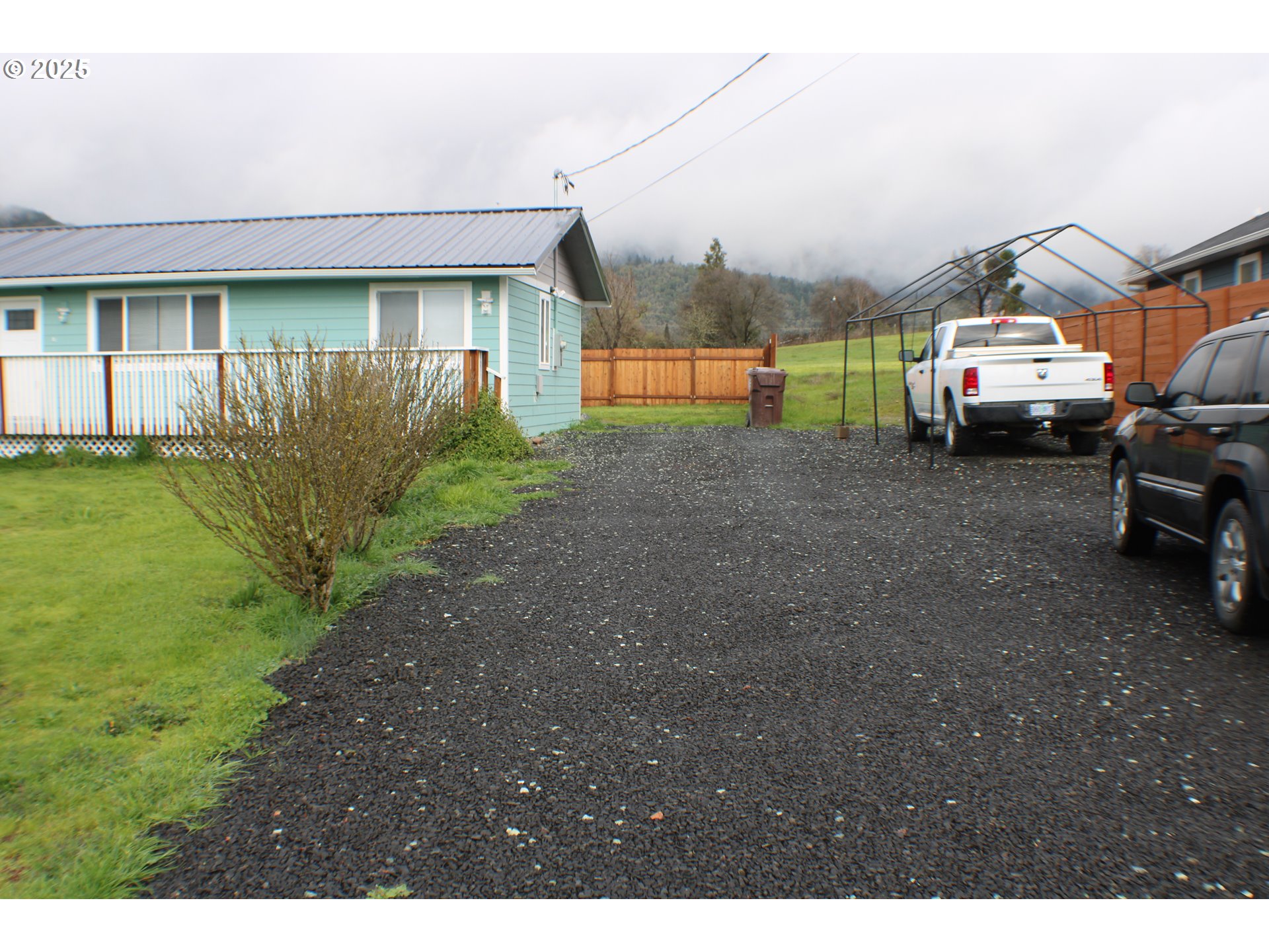 616 4th Avenue Riddle, OR 97469 - Photo 19 of 36 a view of a car parked in front of a house