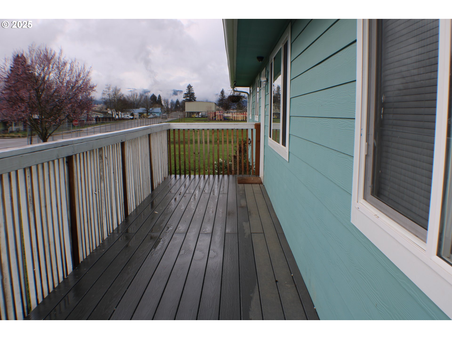 616 4th Avenue Riddle, OR 97469 - Photo 22 of 36 a view of balcony with wooden floor