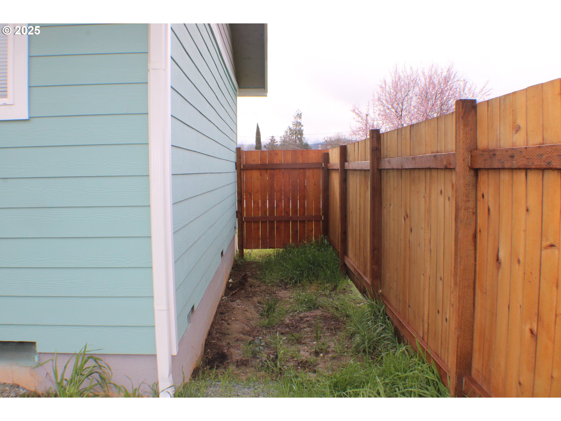 616 4th Avenue Riddle, OR 97469 - Photo 30 of 36 a view of a backyard with pathway