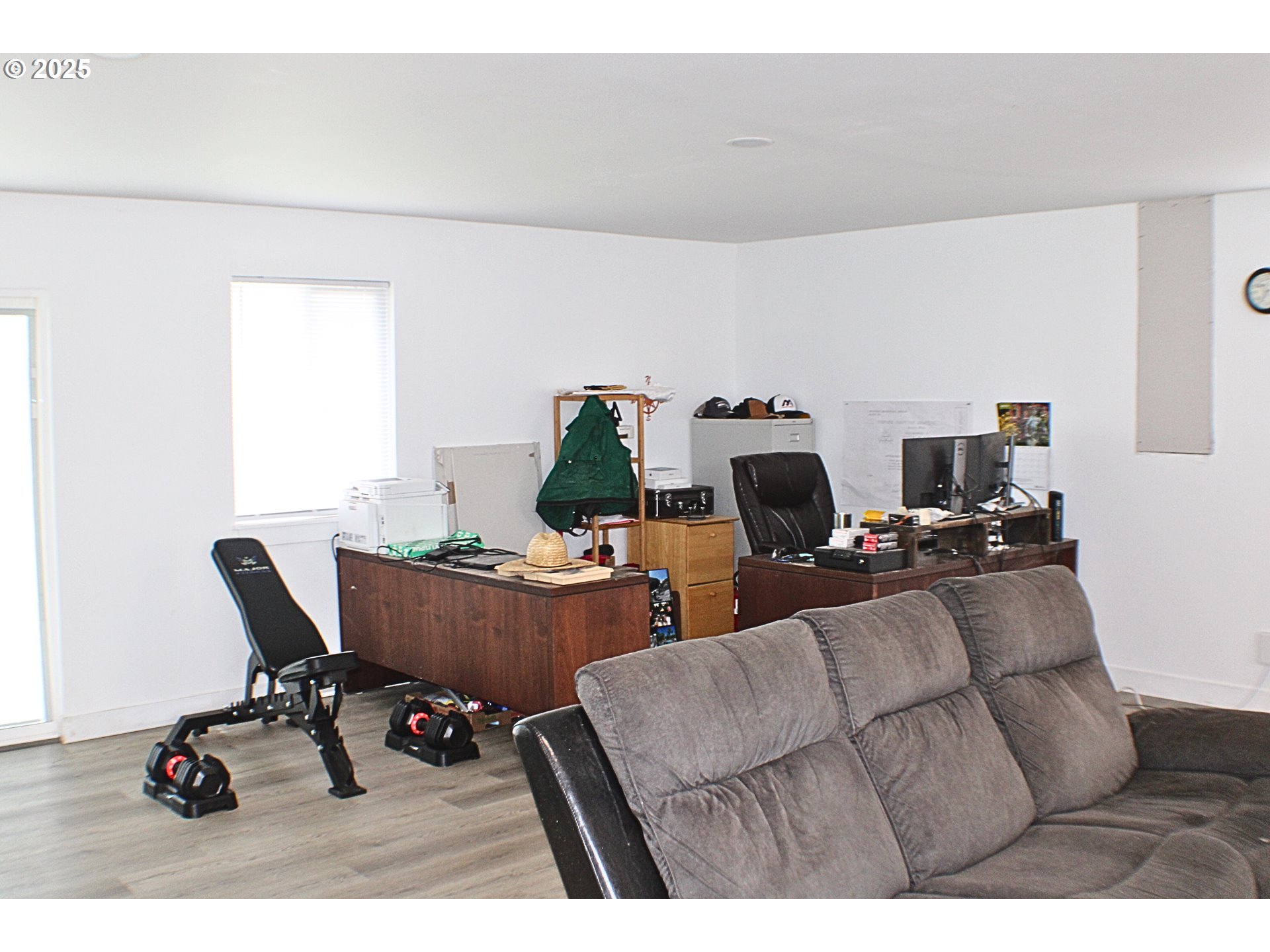 616 4th Avenue Riddle, OR 97469 - Photo 6 of 36 a living room with furniture and a flat screen tv