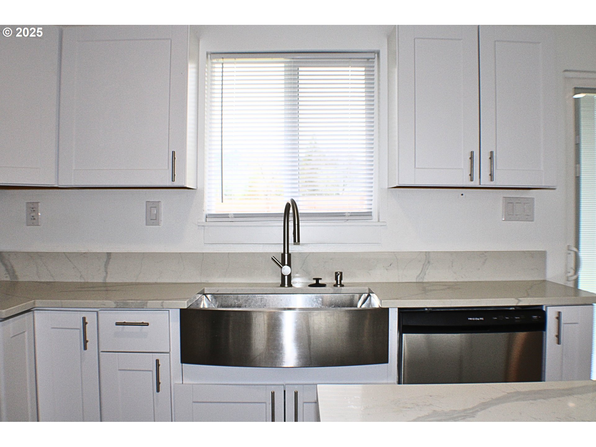 616 4th Avenue Riddle, OR 97469 - Photo 9 of 36 a kitchen with kitchen island a sink appliances and cabinets