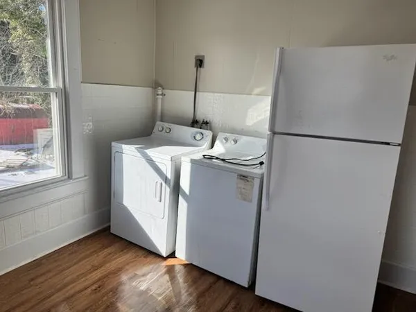 a utility room with dryer and washer