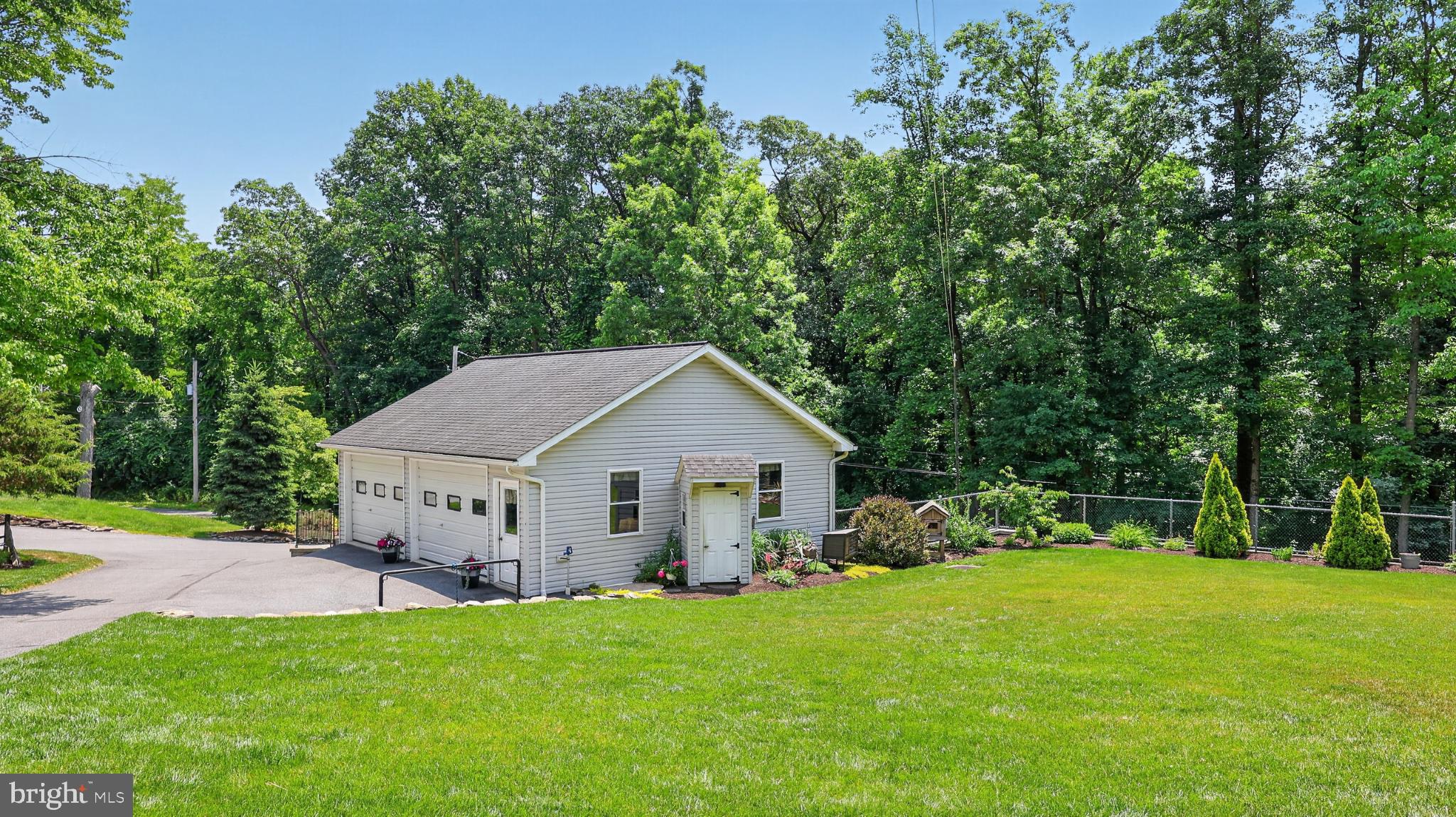257 Hill Road New Holland, PA 17557 - Photo 49 of 94 Charming home nestled in lush greenery.