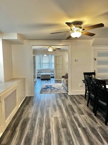 a view of a room with breakfast area