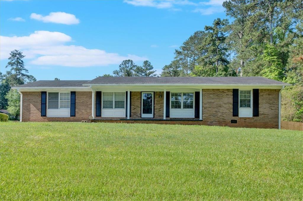 4129 Pepperdine Drive Decatur, GA 30034 - Photo 1 of 1 front view of a house with a garden
