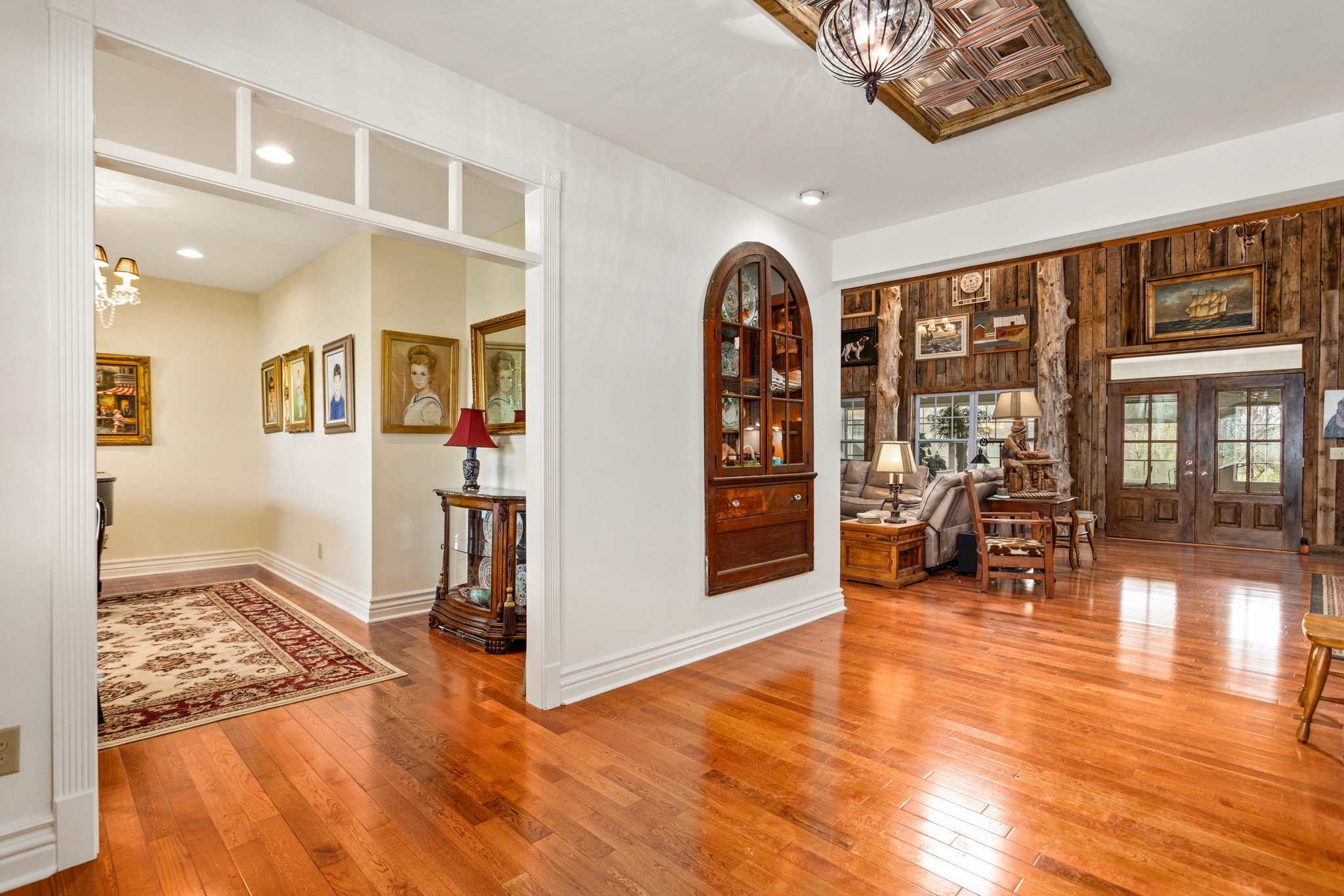 2833 Thompson's Station Road East Thompson's Station, TN 37179 - Photo 3 of 38 a view of a livingroom with hardwood floor and a ceiling fan