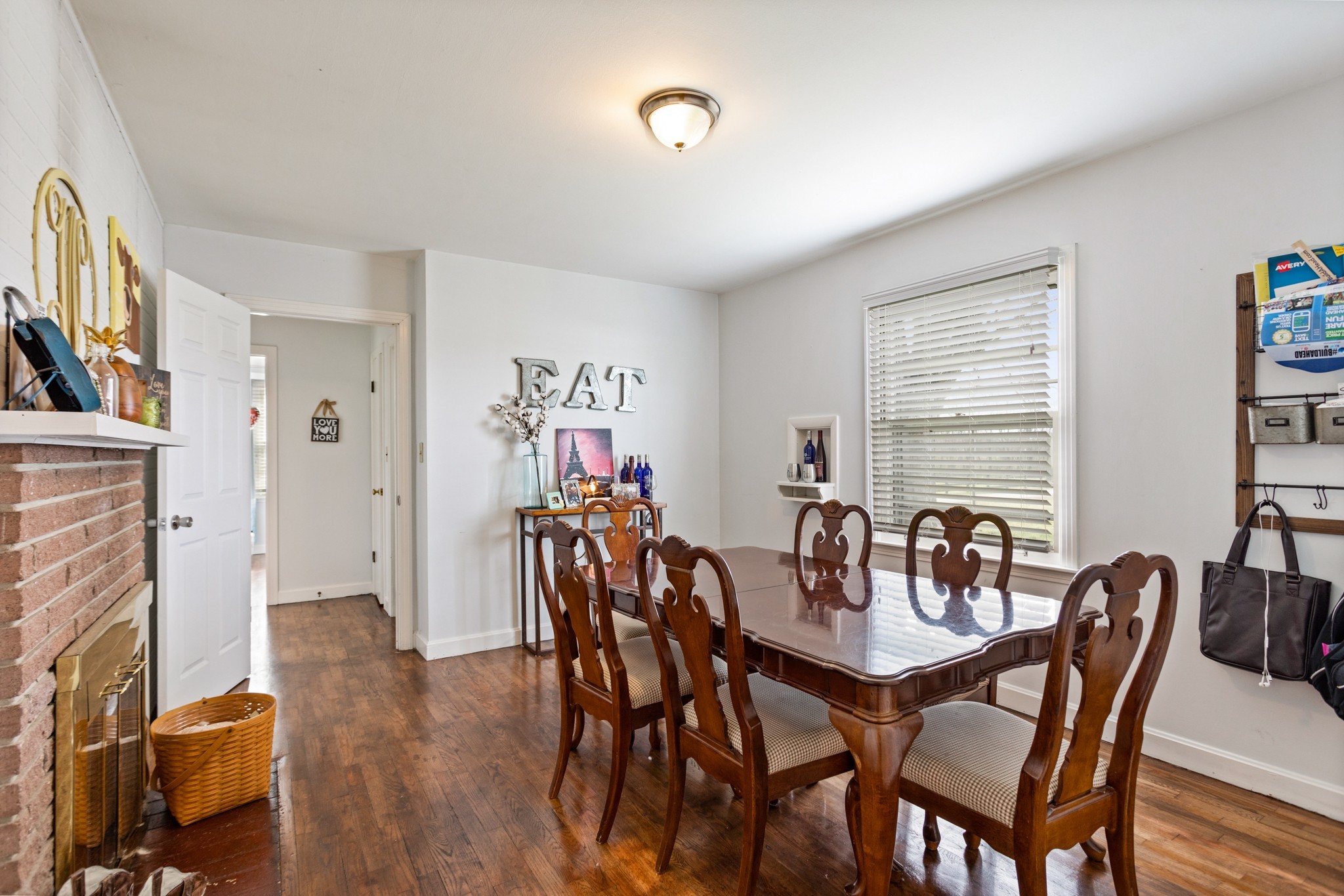 2833 Thompson's Station Road East Thompson's Station, TN 37179 - Photo 31 of 38 a view of a dining room with furniture window and wooden floor