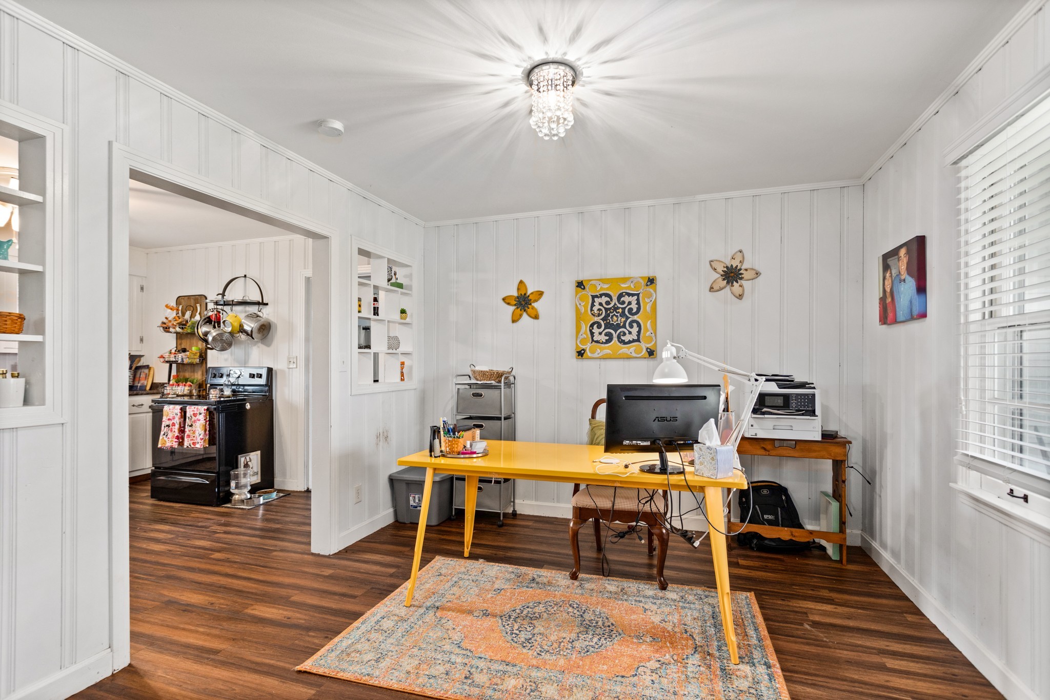2833 Thompson's Station Road East Thompson's Station, TN 37179 - Photo 33 of 38 a workspace with wooden floor and a rug