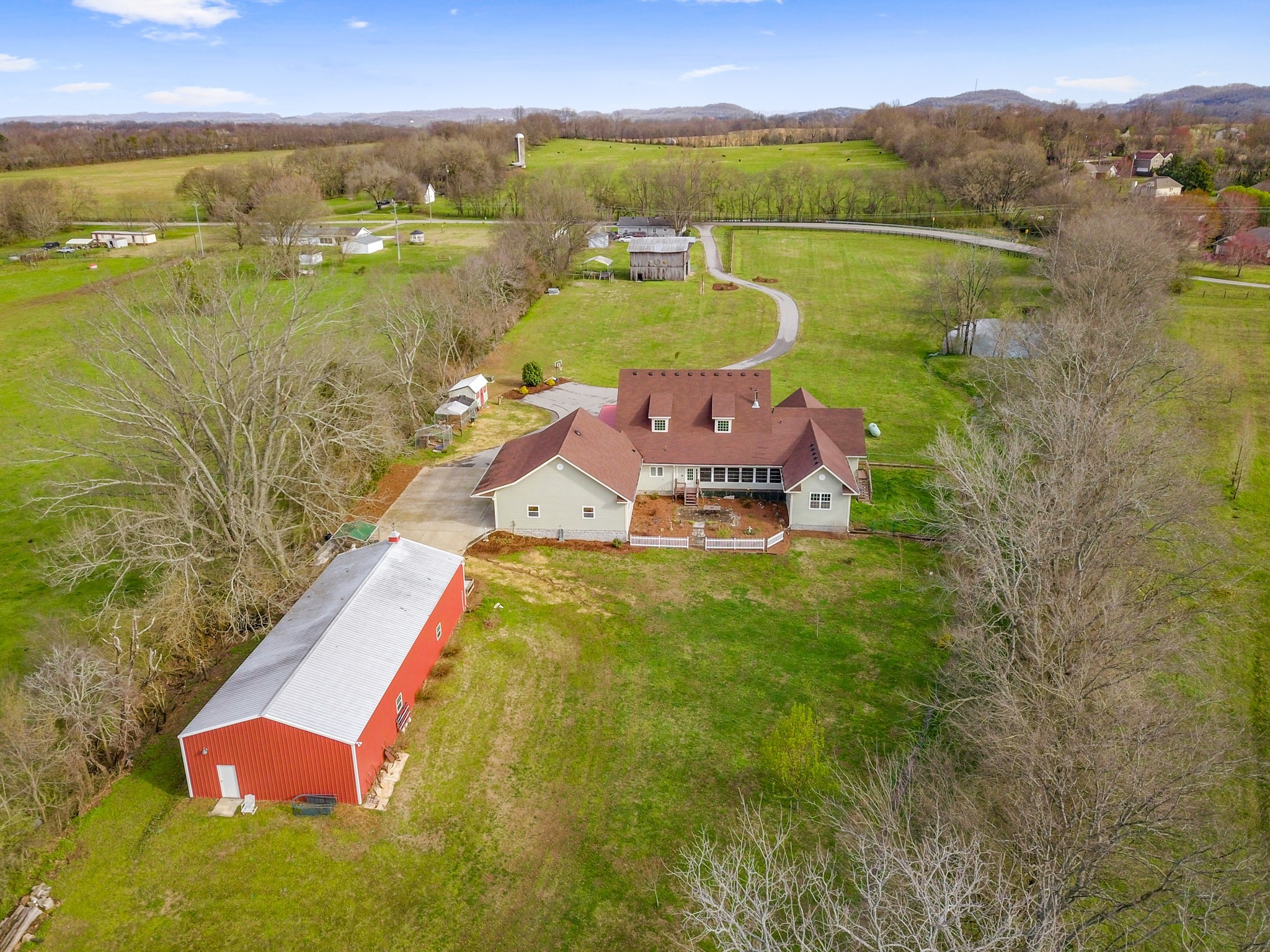 2833 Thompson's Station Road East Thompson's Station, TN 37179 - Photo 37 of 38 a view of a lake with a mountain
