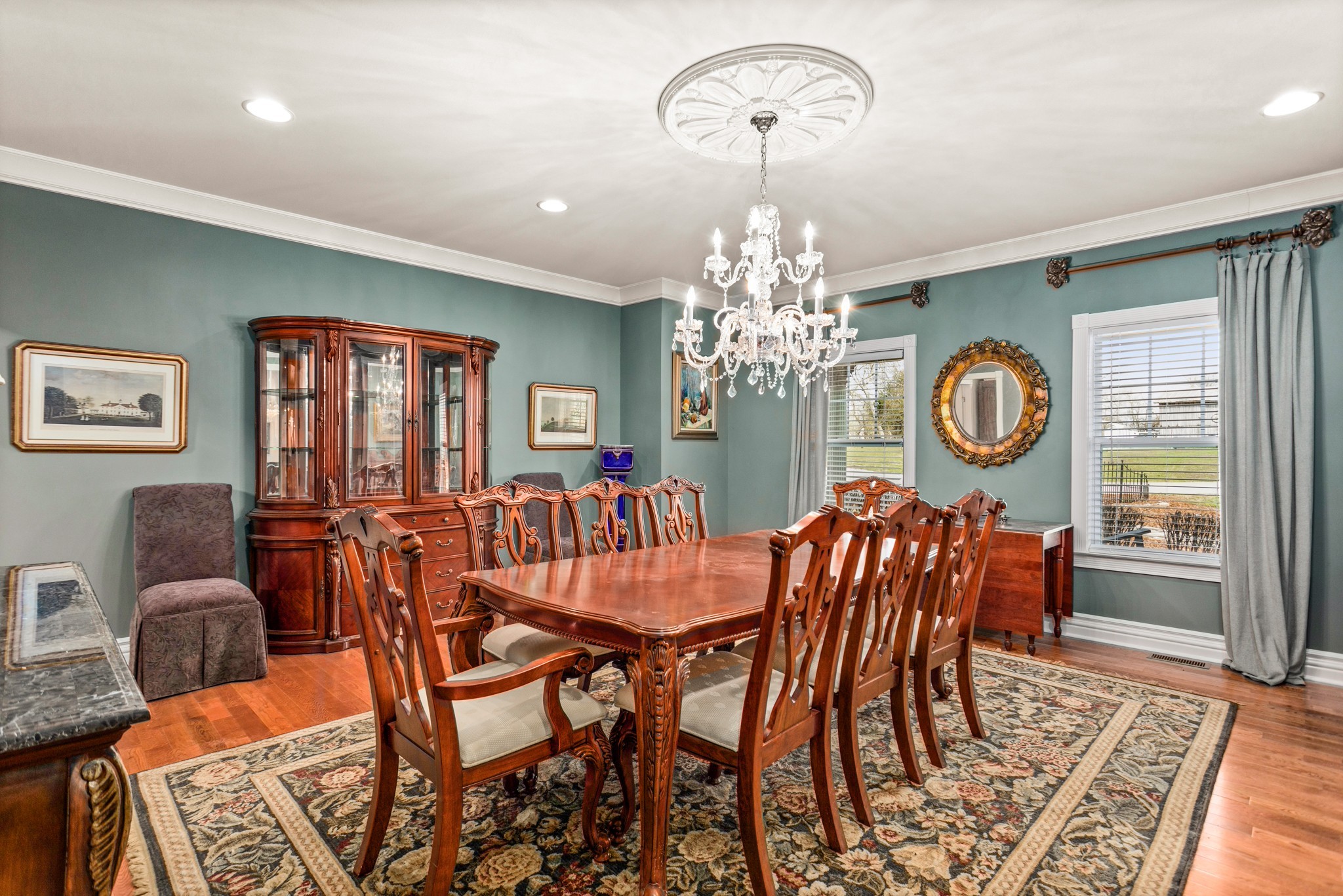 2833 Thompson's Station Road East Thompson's Station, TN 37179 - Photo 5 of 38 a view of a dining room with furniture a chandelier and wooden floor
