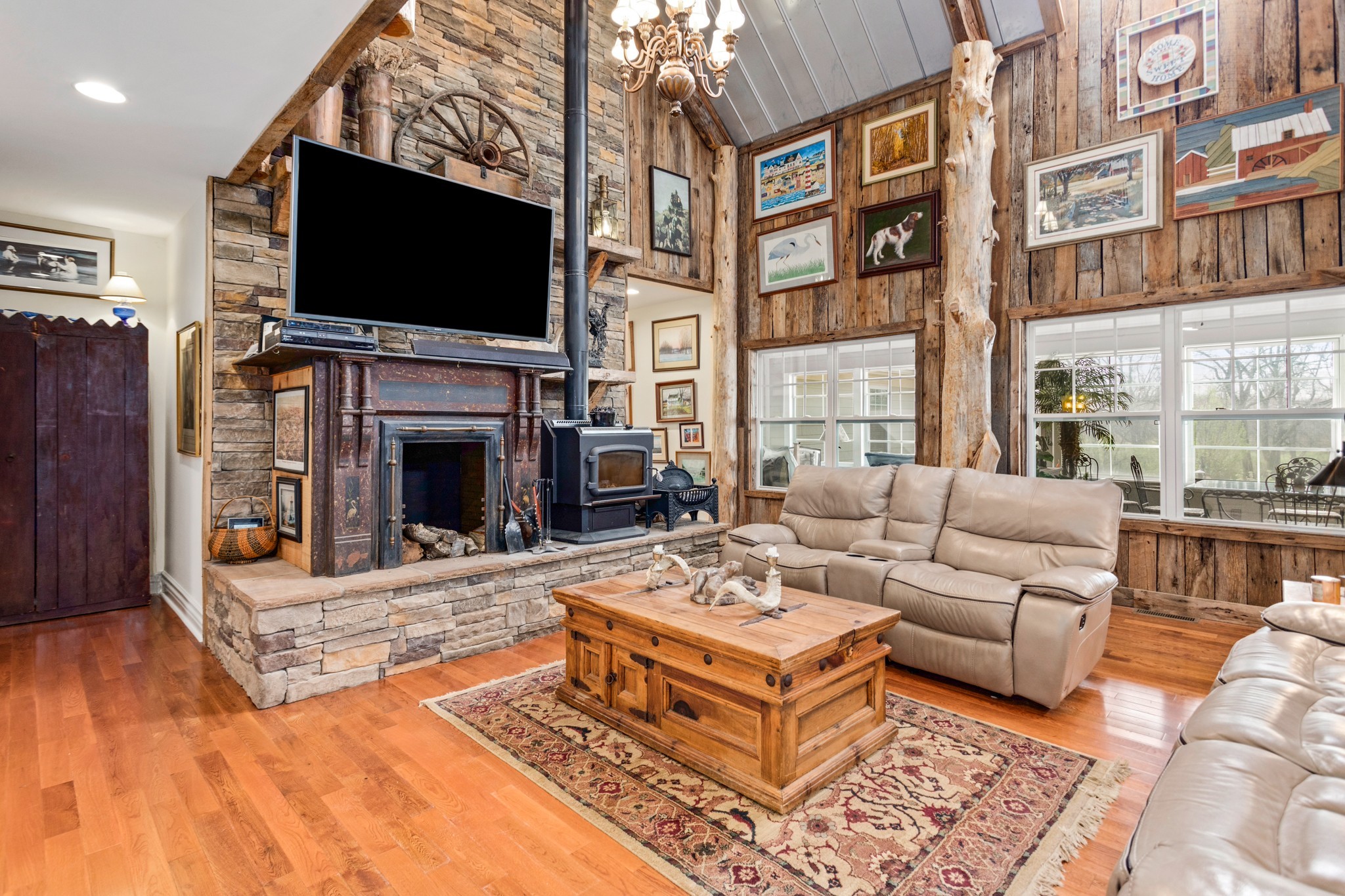 2833 Thompson's Station Road East Thompson's Station, TN 37179 - Photo 7 of 38 a living room with fireplace furniture and a flat screen tv