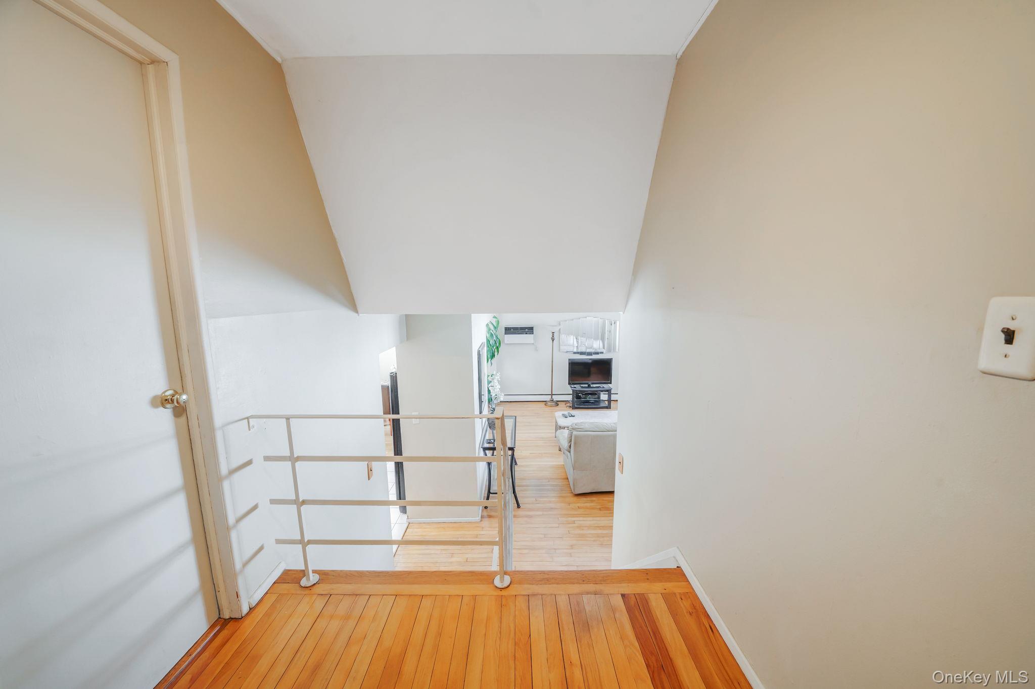 24 Kings Park Road Commack, NY 11725 - Photo 20 of 32 a view of a kitchen from the hallway