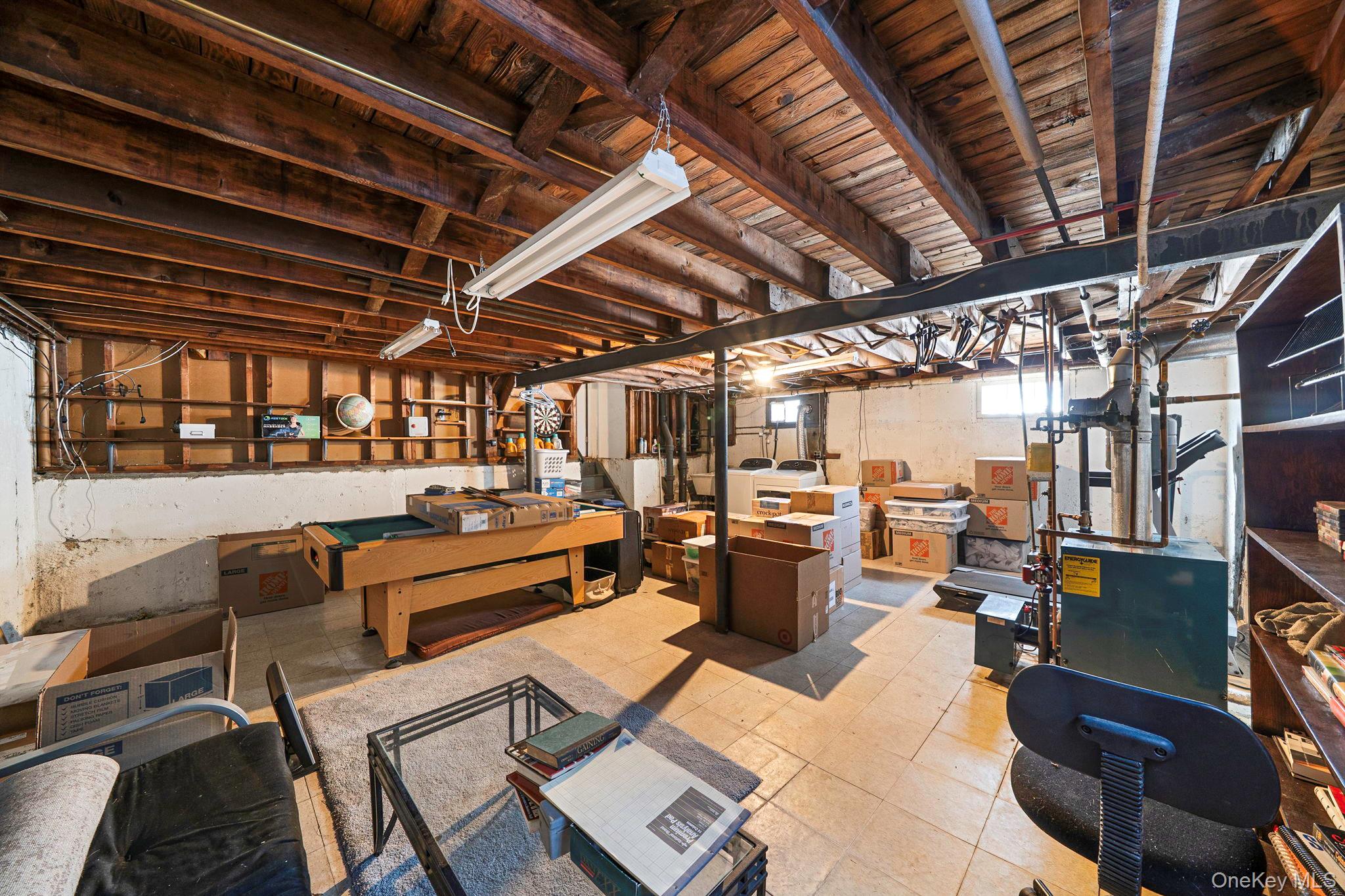 24 Kings Park Road Commack, NY 11725 - Photo 31 of 32 a view of a patio with table and chairs