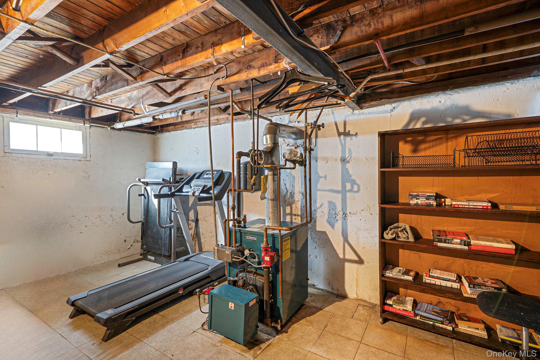 24 Kings Park Road Commack, NY 11725 - Photo 32 of 32 a view of a room with gym equipment