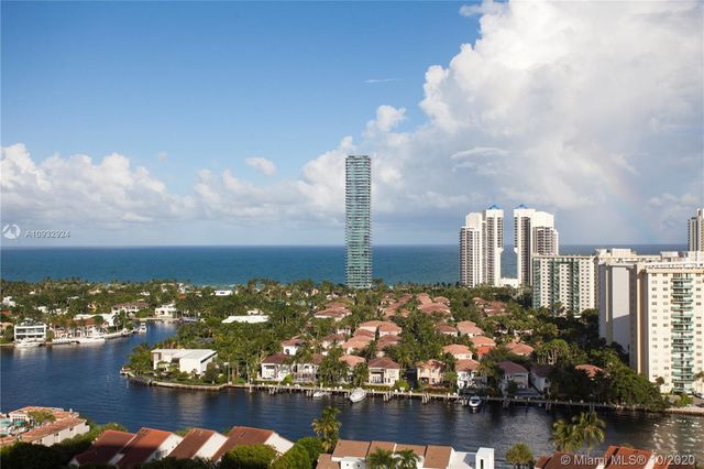 a view of a city with tall buildings