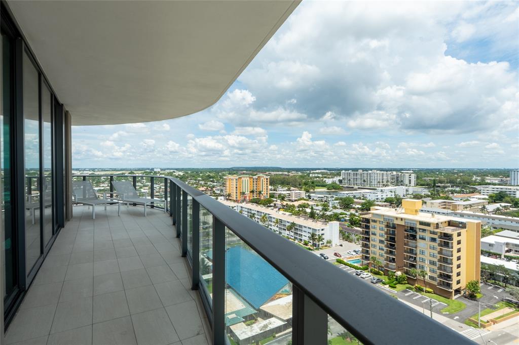 730 North Ocean Boulevard, Unit 1501 Pompano Beach, FL 33062 - Photo 11 of 56 a view of a city from a balcony