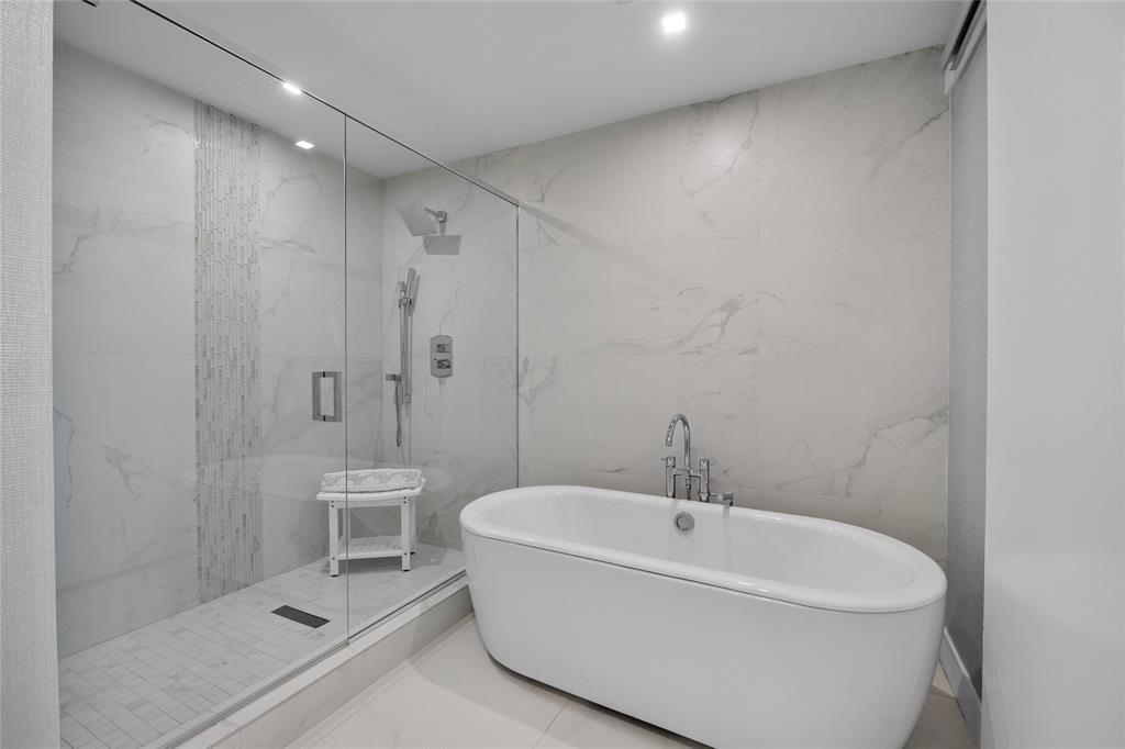 730 North Ocean Boulevard, Unit 1501 Pompano Beach, FL 33062 - Photo 25 of 56 a white bath tub sitting next to a white sink