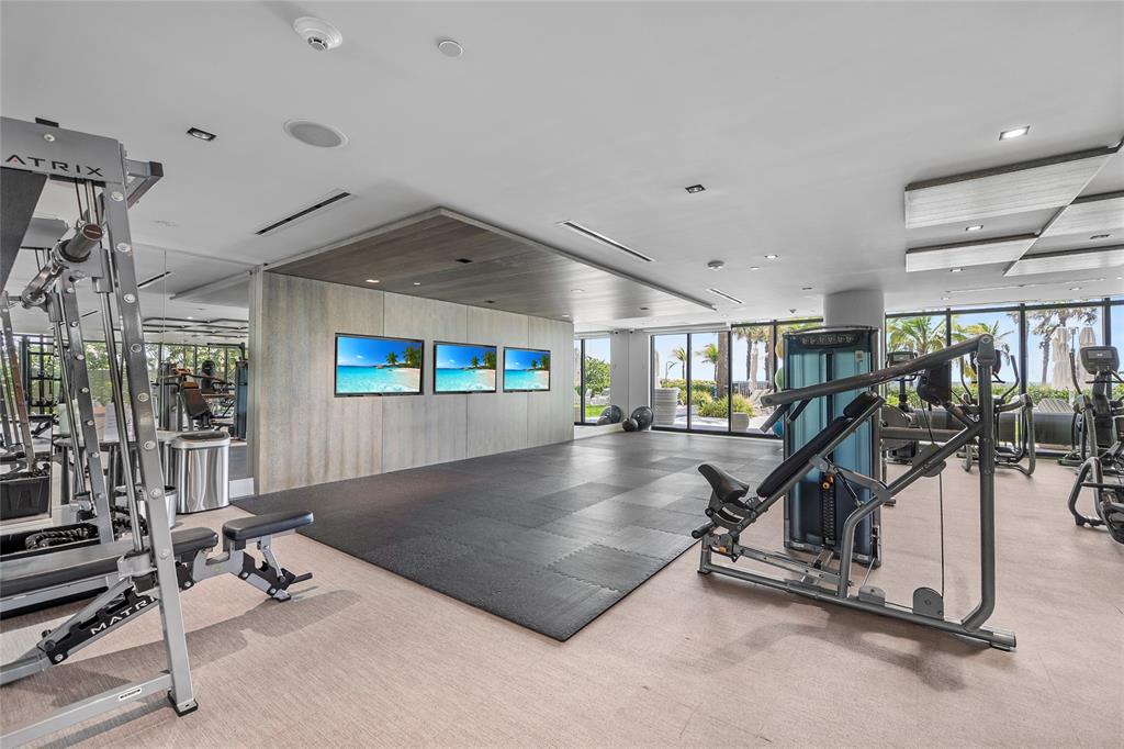 730 North Ocean Boulevard, Unit 1501 Pompano Beach, FL 33062 - Photo 30 of 56 a view of a room with gym equipment