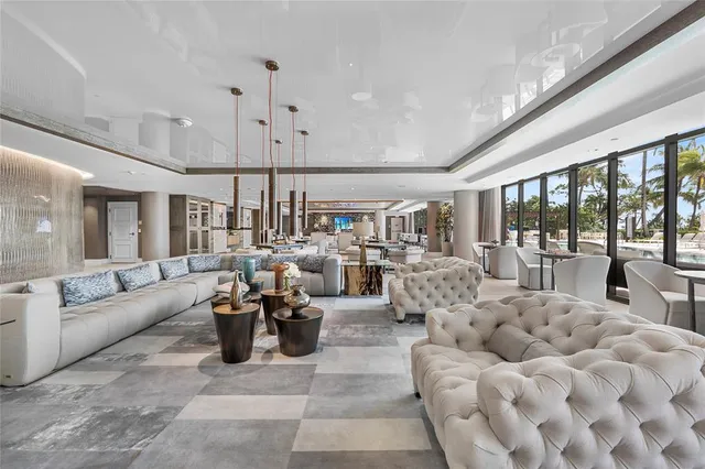 a view of kitchen with refrigerator and window