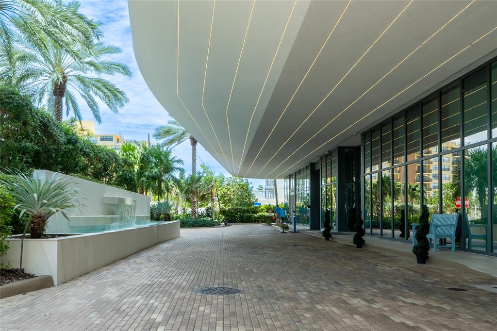 730 North Ocean Boulevard, Unit 1501 Pompano Beach, FL 33062 - Photo 37 of 56 a view of a house with a street