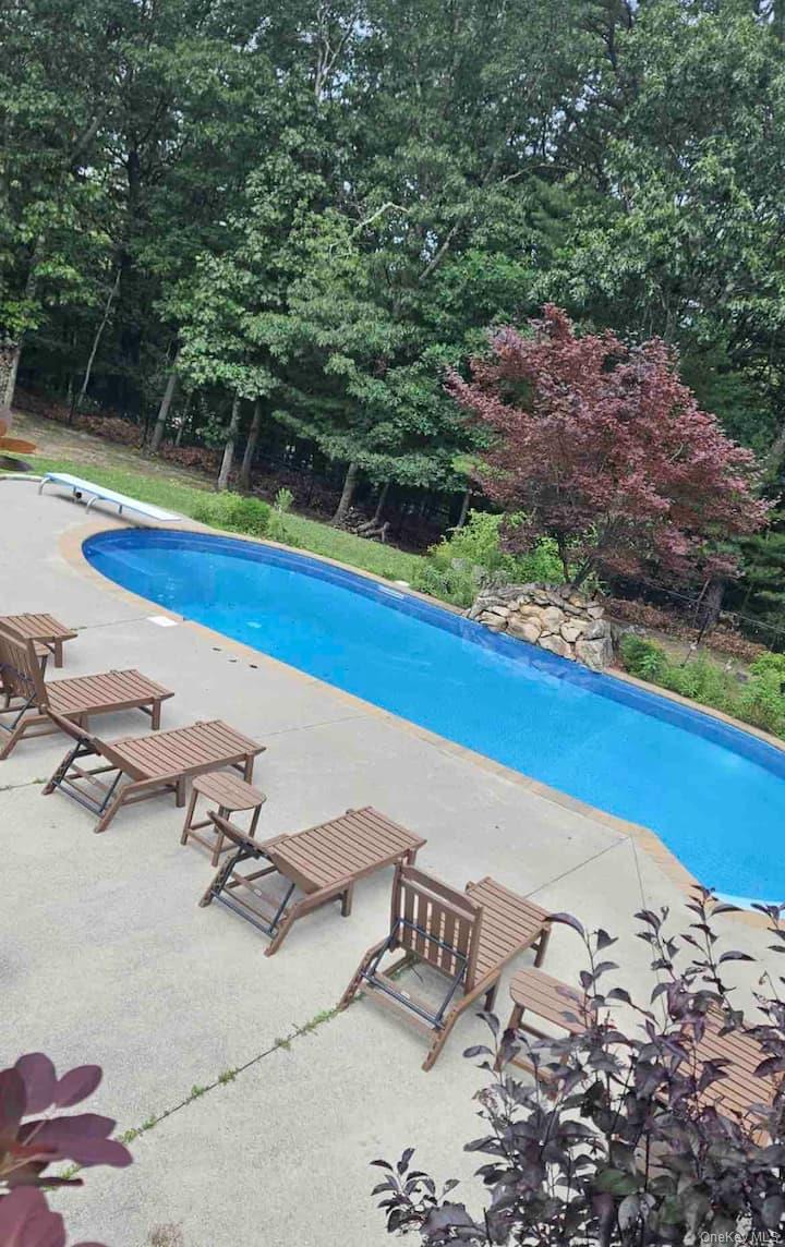 1 Brittany Court Ridge, NY 11961 - Photo 33 of 40 a view of a terrace with sitting area