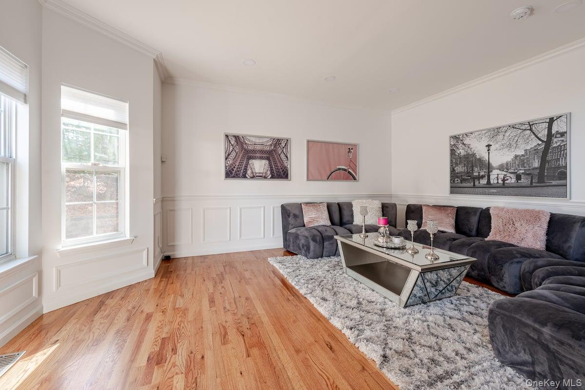 1 Brittany Court Ridge, NY 11961 - Photo 5 of 40 a living room with furniture or couch and a window