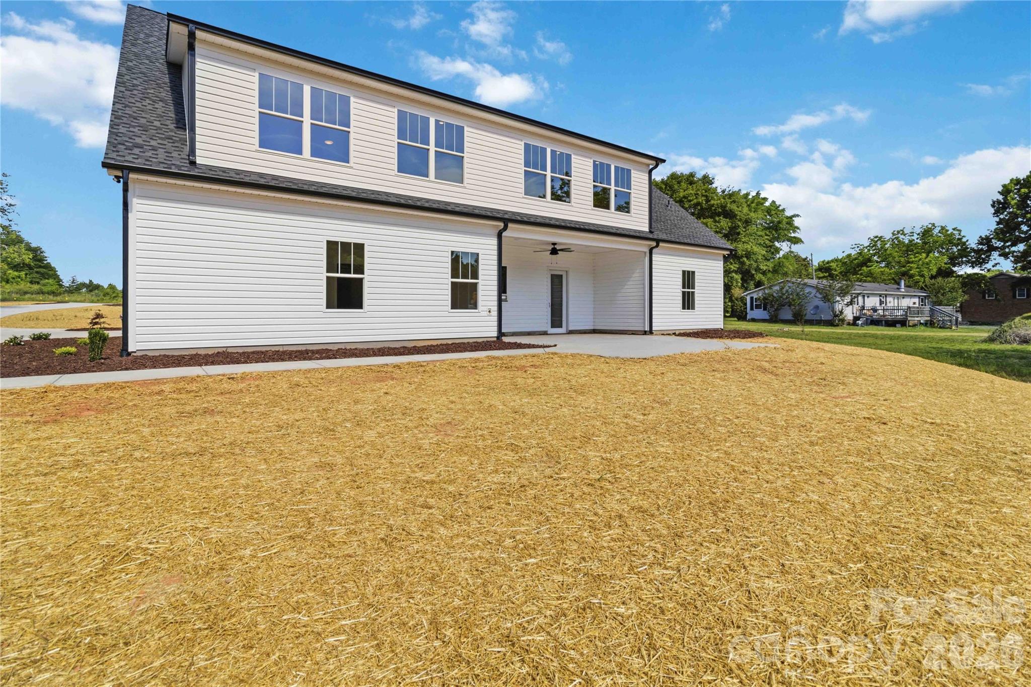 352 Adams Road Clover, SC 29710 - Photo 28 of 38 a house that has a swimming pool in front of it
