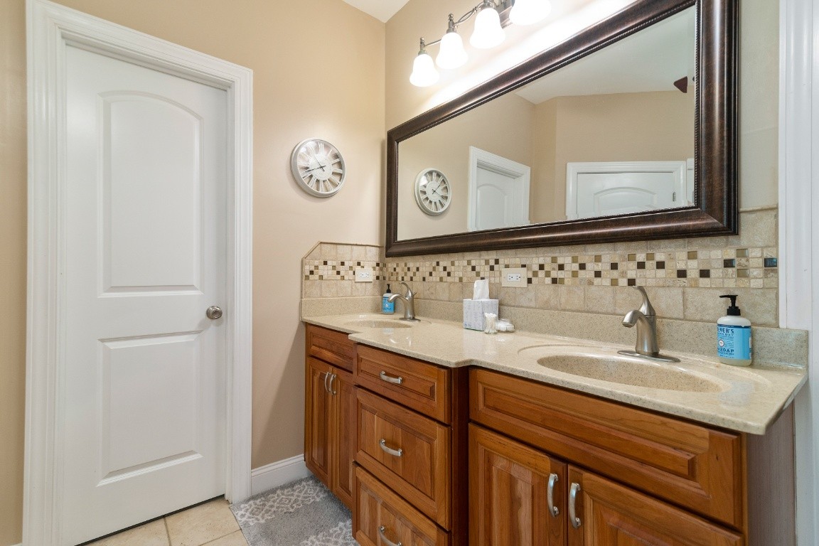 2099 Double Branch Road Columbia, TN 38401 - Photo 22 of 43 a bathroom with a sink and a mirror