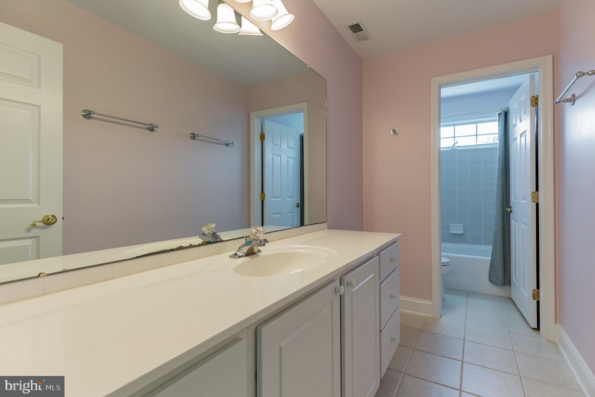 14510 South Solomons Island Road South Solomons, MD 20688 - Photo 23 of 31 Upper level 2nd full bath, ceramic tile