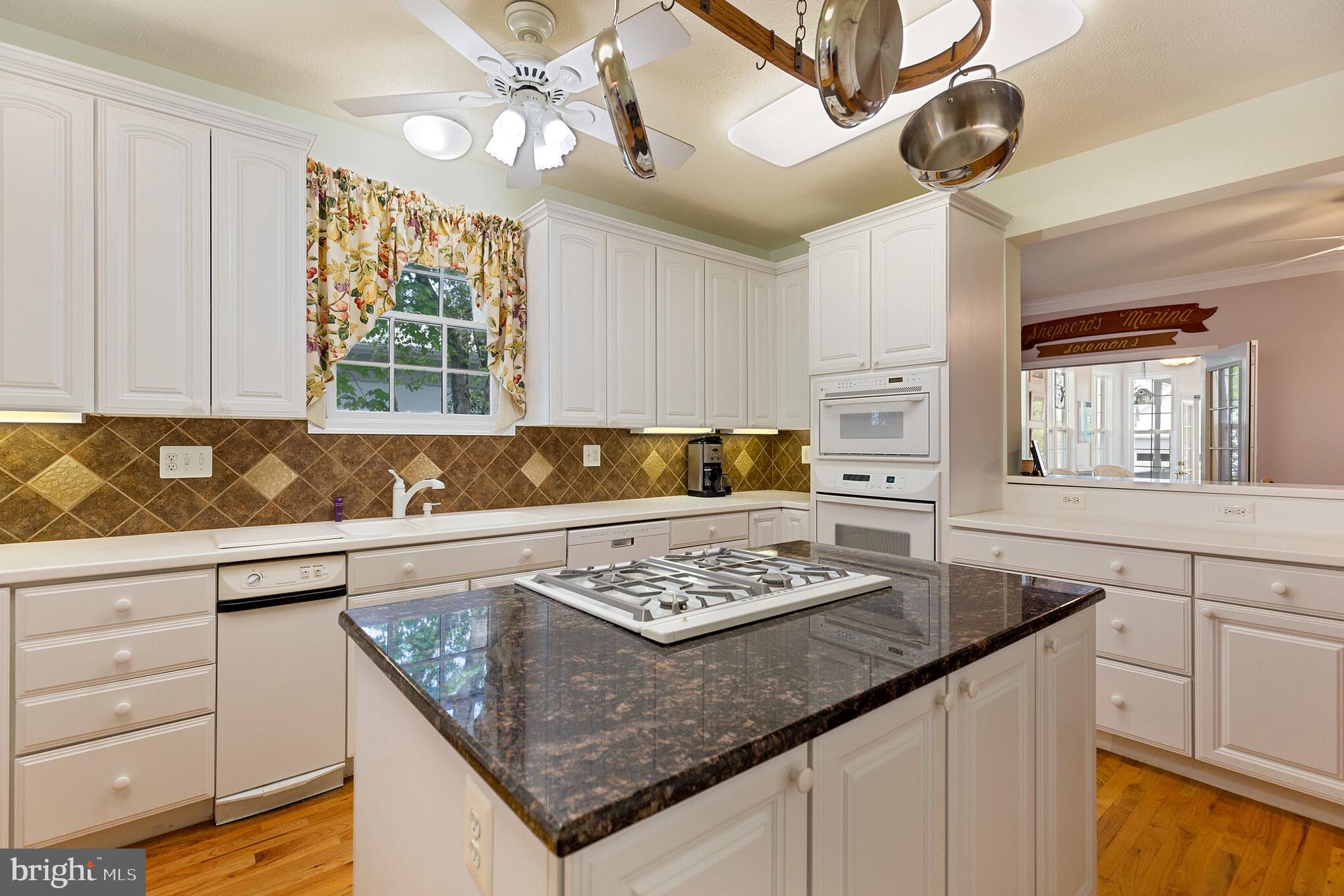 14510 South Solomons Island Road South Solomons, MD 20688 - Photo 10 of 31 Gourmet kitchen with island and gas stove