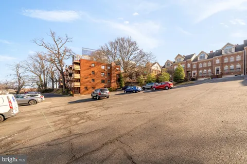 a view of road with buildings
