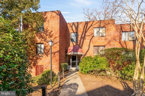 front view of a house with a trees